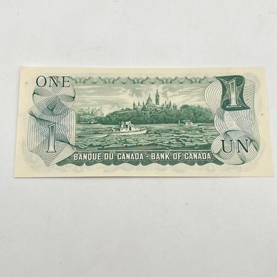 LOT 123J: Canadian Currency - Around 79.84 CAD