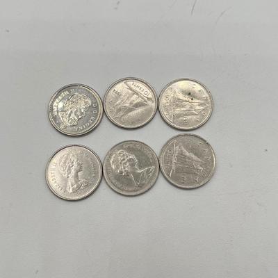 LOT 123J: Canadian Currency - Around 79.84 CAD