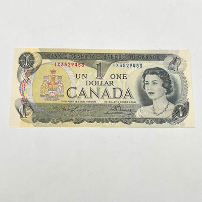LOT 123J: Canadian Currency - Around 79.84 CAD
