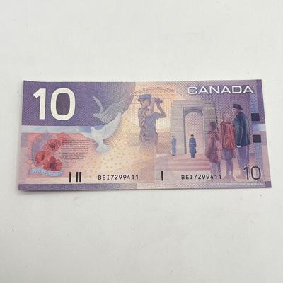 LOT 123J: Canadian Currency - Around 79.84 CAD