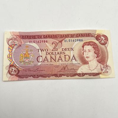 LOT 123J: Canadian Currency - Around 79.84 CAD
