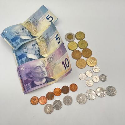 LOT 123J: Canadian Currency - Around 79.84 CAD