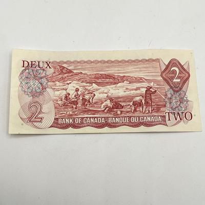 LOT 123J: Canadian Currency - Around 79.84 CAD