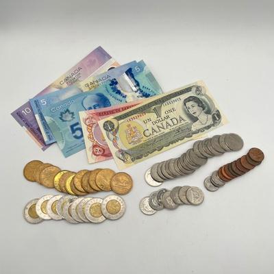 LOT 123J: Canadian Currency - Around 79.84 CAD