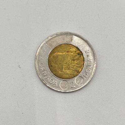 LOT 123J: Canadian Currency - Around 79.84 CAD