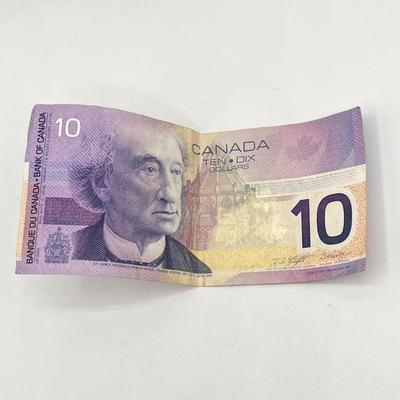 LOT 123J: Canadian Currency - Around 79.84 CAD
