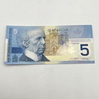 LOT 123J: Canadian Currency - Around 79.84 CAD