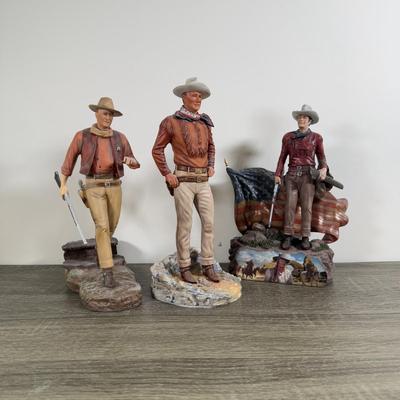 LOT 167L: John Wayne Porcelain Statues - The Franklin Mint "The Duke", "Western Lawman" and Bradford Exchange Trails...