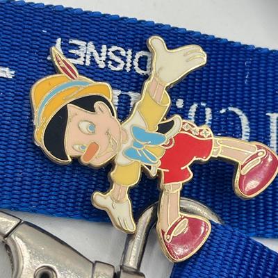 LOT 183J: Collection of Vintage Disney Pins w/ Lanyard
