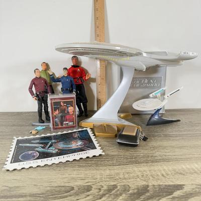 LOT 191L: Star Trek Collection - TNG on DVD, Action Figures, Cards, USS Enterprise & More