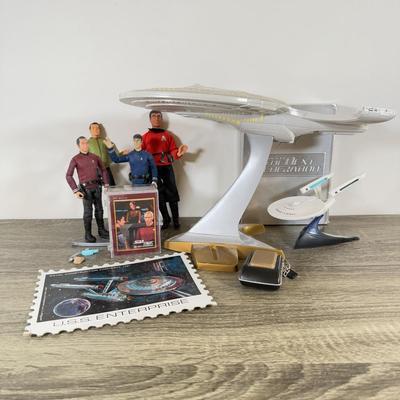 LOT 191L: Star Trek Collection - TNG on DVD, Action Figures, Cards, USS Enterprise & More