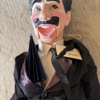 LOT 240L: Groucho Marx 27" Pull String Ventriloquist Dummy Doll w/ Needlepoint Marx Portrait, DVDs & Time Magazine