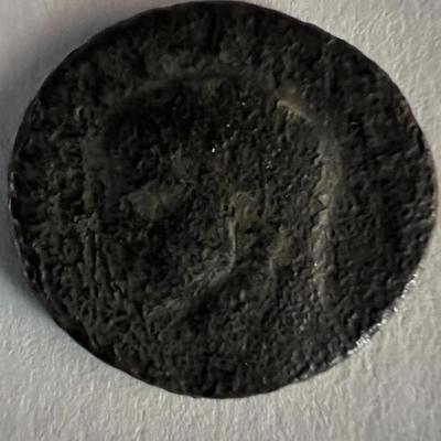 Bronze Roman coin circa 370 AD. 1 inch