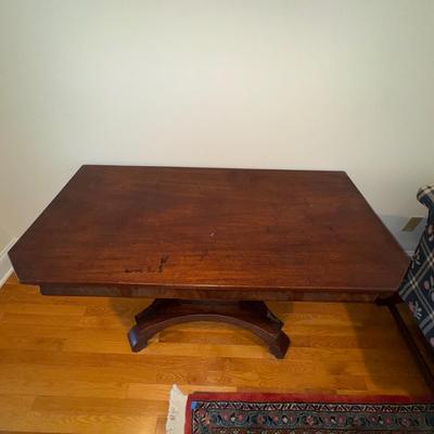 Sale Photo Thumbnail #52: Antique Empire Flip top Game Table. Appears to be mahogany. Flip Top has signs of wear and needs to be reattached.  . Some veneer  on base is also missing due to wear and age. 
48”W x 24”D x 28”H