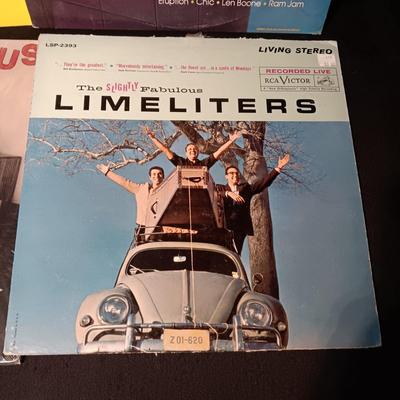 4 VINYL RECORDS WITH 50'S MUSIC