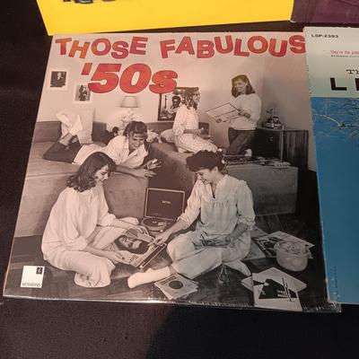 4 VINYL RECORDS WITH 50'S MUSIC