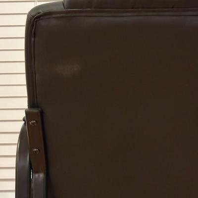 Black Chair and Brown Footstool