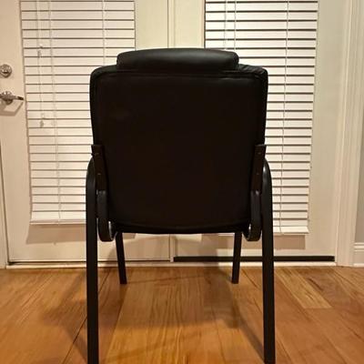 Black Chair and Brown Footstool