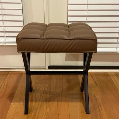 Black Chair and Brown Footstool