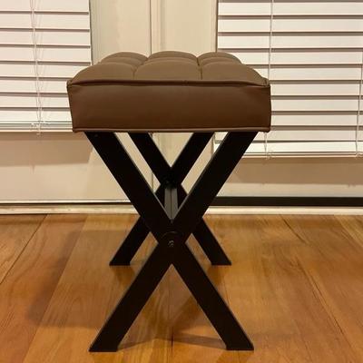 Black Chair and Brown Footstool