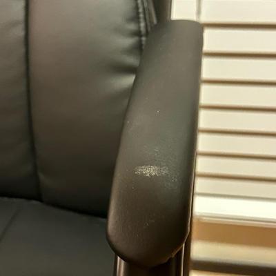 Black Chair and Brown Footstool