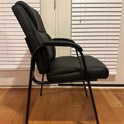 Black Chair and Brown Footstool