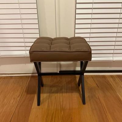 Black Chair and Brown Footstool