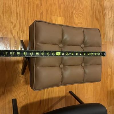 Black Chair and Brown Footstool