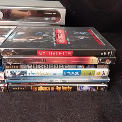 MAGNAVOX DVD PLAYER AND AN ASSORTMENT OF R RATED MOVIES