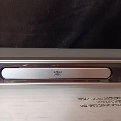 MAGNAVOX DVD PLAYER AND AN ASSORTMENT OF R RATED MOVIES