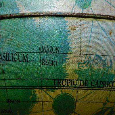Vintage Ohio Art Pressed Metal Latin Globe Coin Bank 5.25” Tall