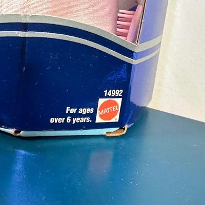 LOT 258: Enchanted Evening Barbie & Original 1958 Replica in Package