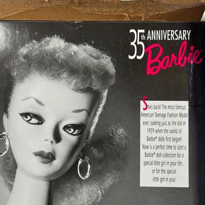 LOT 258: Enchanted Evening Barbie & Original 1958 Replica in Package