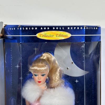 LOT 258: Enchanted Evening Barbie & Original 1958 Replica in Package