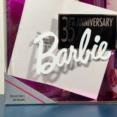 LOT 258: Enchanted Evening Barbie & Original 1958 Replica in Package