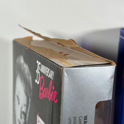 LOT 258: Enchanted Evening Barbie & Original 1958 Replica in Package