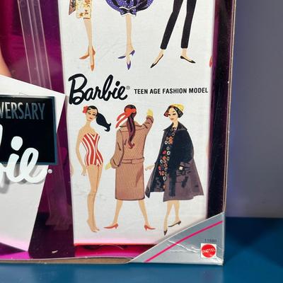 LOT 258: Enchanted Evening Barbie & Original 1958 Replica in Package