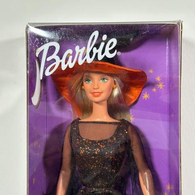 LOT 259: Vintage Holiday/Winter Barbie Collection in Packaging
