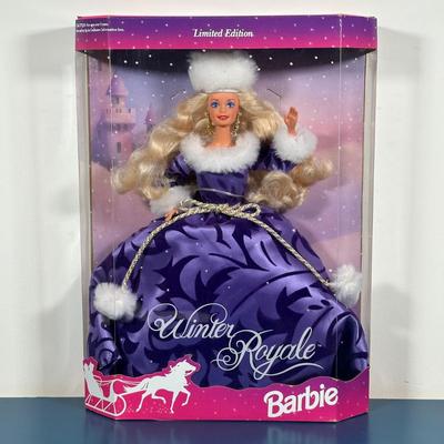LOT 259: Vintage Holiday/Winter Barbie Collection in Packaging