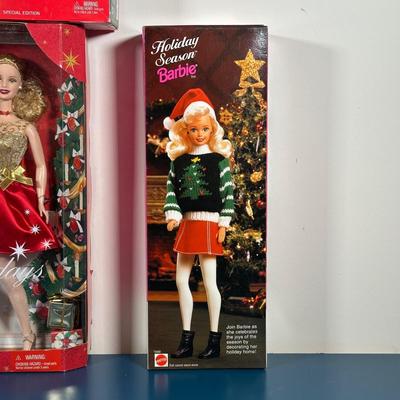 LOT 259: Vintage Holiday/Winter Barbie Collection in Packaging