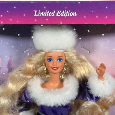 LOT 259: Vintage Holiday/Winter Barbie Collection in Packaging