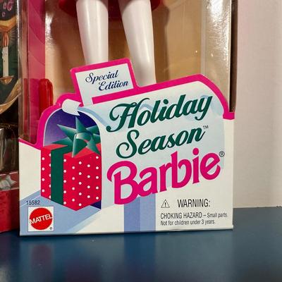 LOT 259: Vintage Holiday/Winter Barbie Collection in Packaging
