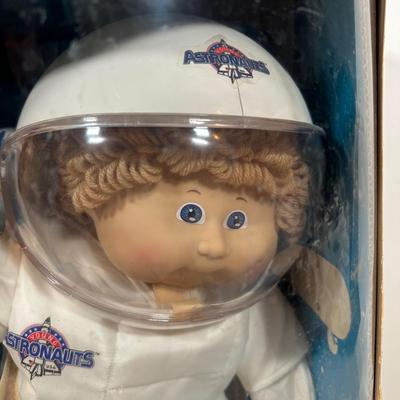 LOT 164: Cabbage Patch Kids Collection - World Traveler, Growing Hair & Young Astronaut in Box