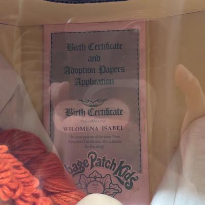 LOT 164: Cabbage Patch Kids Collection - World Traveler, Growing Hair & Young Astronaut in Box