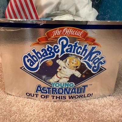 LOT 164: Cabbage Patch Kids Collection - World Traveler, Growing Hair & Young Astronaut in Box