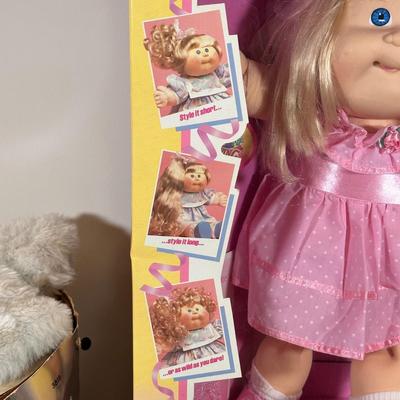 LOT 164: Cabbage Patch Kids Collection - World Traveler, Growing Hair & Young Astronaut in Box