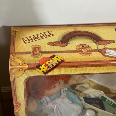 LOT 164: Cabbage Patch Kids Collection - World Traveler, Growing Hair & Young Astronaut in Box