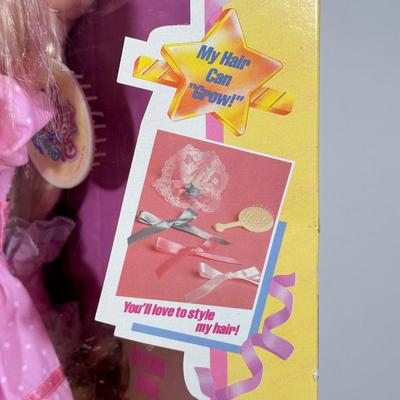 LOT 164: Cabbage Patch Kids Collection - World Traveler, Growing Hair & Young Astronaut in Box