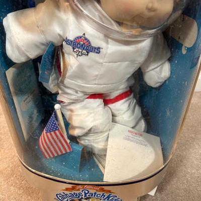 LOT 164: Cabbage Patch Kids Collection - World Traveler, Growing Hair & Young Astronaut in Box