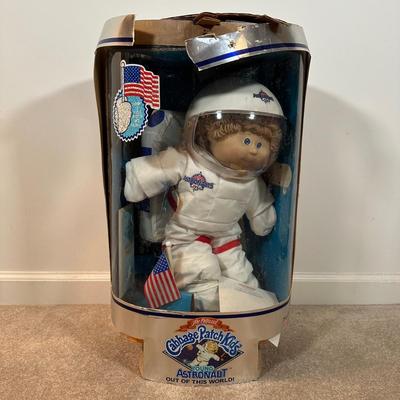LOT 164: Cabbage Patch Kids Collection - World Traveler, Growing Hair & Young Astronaut in Box